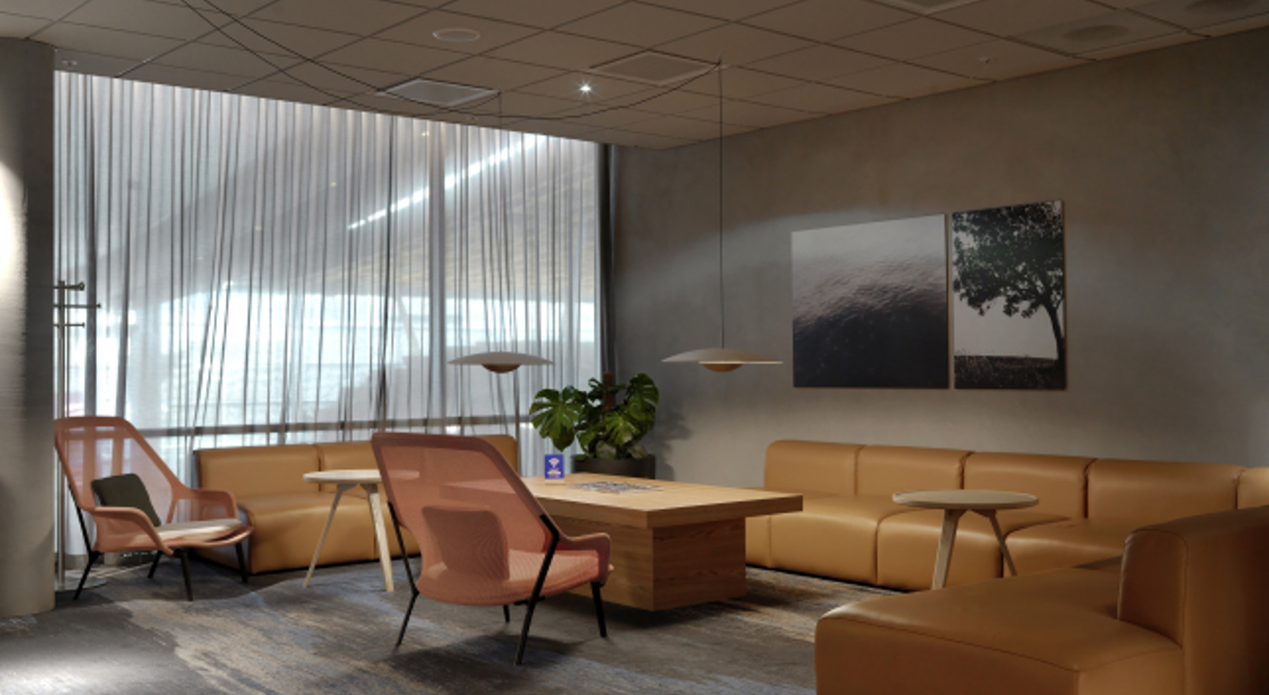 Modern studio design in an airport lounge with beige sofas, pink chairs, round wooden tables, and hanging lamps, in a room with large windows and wall art.