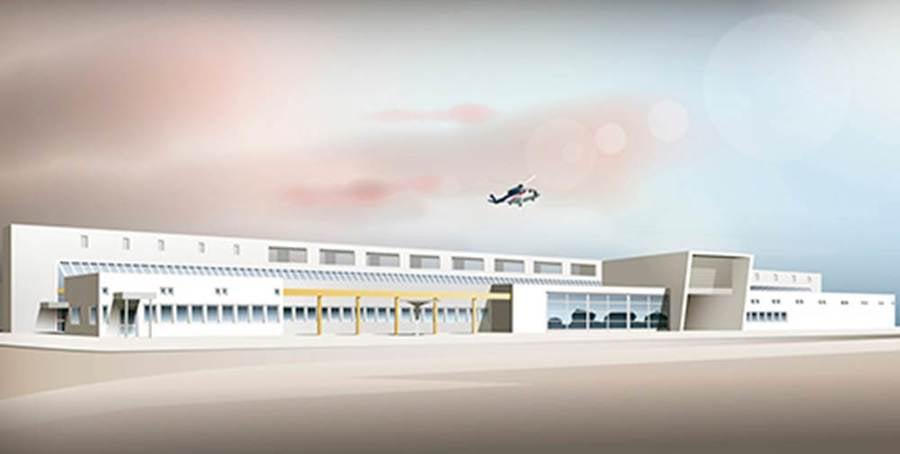 Flyplassbygning med moderne design, sett i dagslys med helikopter som svever i bakgrunnen.